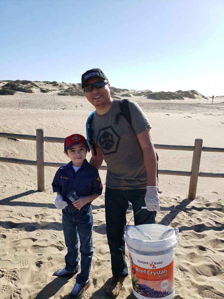 Christian-and-son-at-beach-clean-up